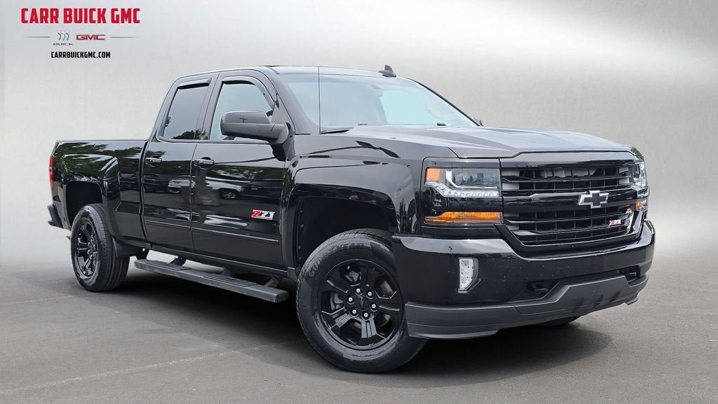 2016 Chevrolet Silverado 1500 LT in Black — front three-quarter view