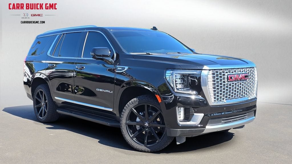 2024 GMC Yukon Denali in Onyx Black — front three-quarter view