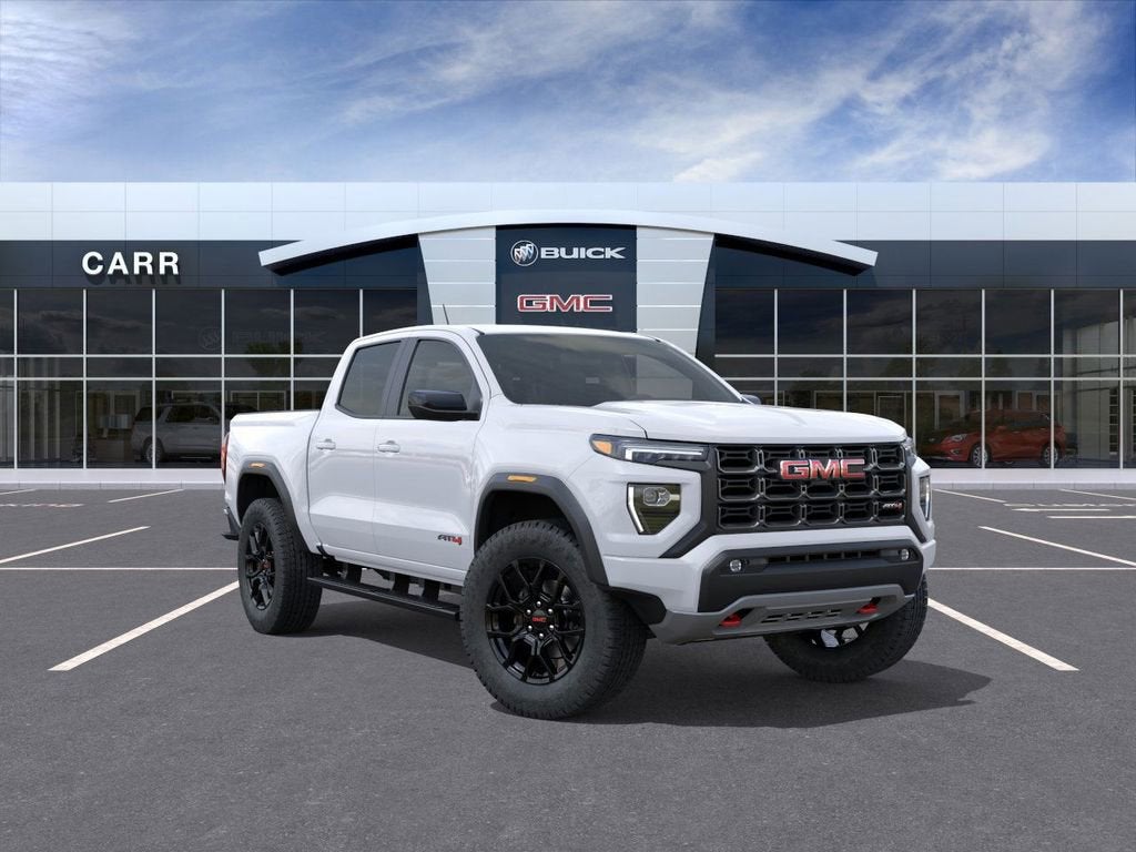 2026 GMC Canyon AT4 in Summit White — front three-quarter view