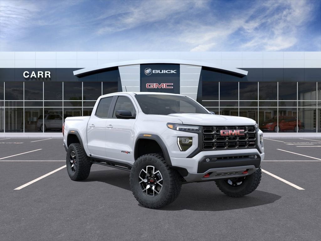 2026 GMC Canyon AT4X in Summit White — front three-quarter view