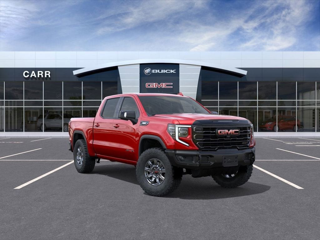 2026 GMC Sierra 1500 AT4X in Volcanic Red Tintcoat — front three-quarter view