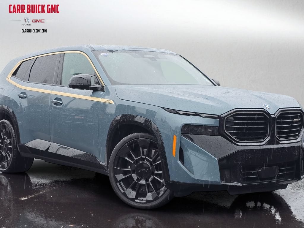 2023 BMW XM BASE in Green — front three-quarter view