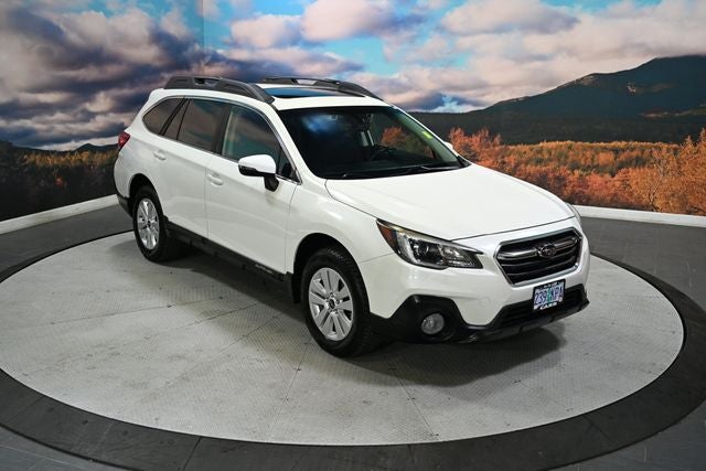 2018 Subaru Outback 2.5i Premium in Crystal White Pearl — front three-quarter view
