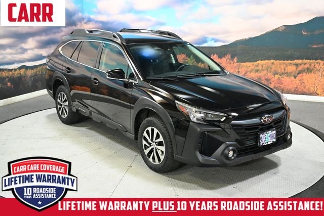 2023 Subaru Outback Premium in Crystal Black Silica — front three-quarter view
