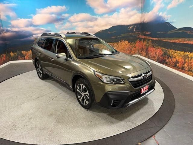 2022 Subaru Outback Touring in Autumn Green Metallic — front three-quarter view