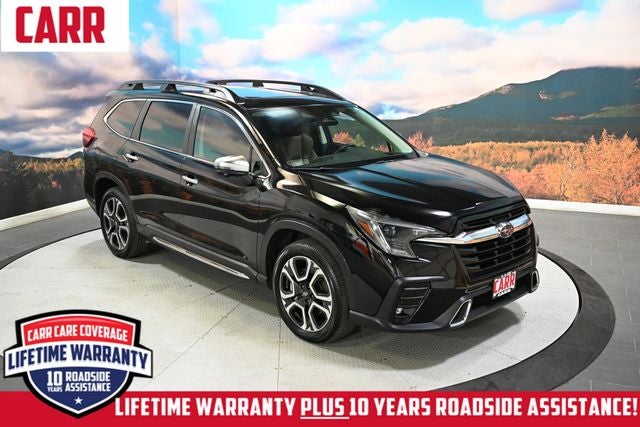 2023 Subaru Ascent Touring in Crystal Black Silica — front three-quarter view