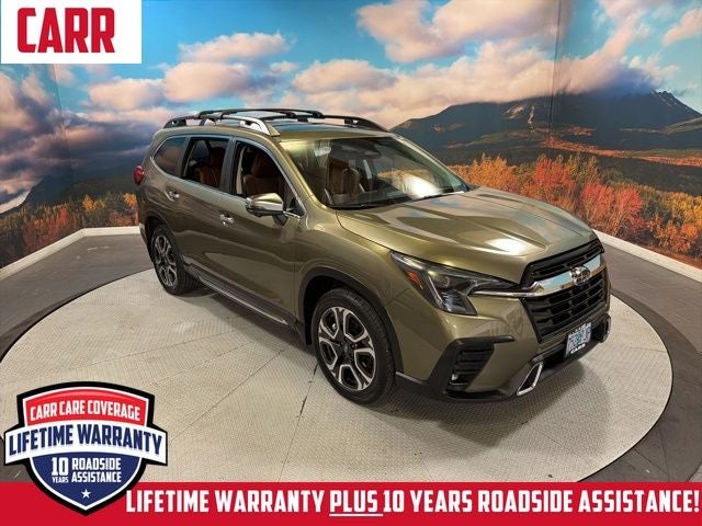 2023 Subaru Ascent Touring in Green Metallic — front three-quarter view