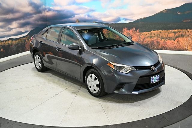 2014 Toyota Corolla L in Slate Metallic — front three-quarter view
