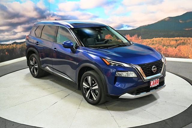 2023 Nissan Rogue Platinum in Caspian Blue Metallic — front three-quarter view