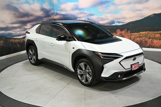 2023 Subaru Solterra Touring in Cosmic White Pearl 2-Tone — front three-quarter view
