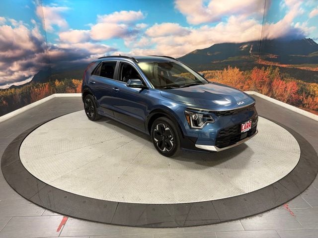 2024 Kia Niro EV Wind in Mineral Blue — front three-quarter view